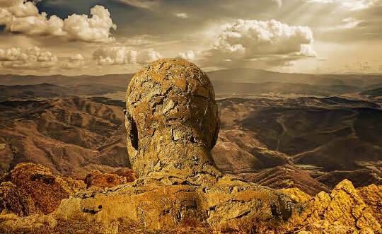 Horoscope Week: February 15 - 21, 2021 image of the statue of a man made of stones, overlooking a valley