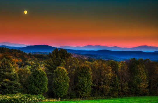 Horoscope Week: February 22 - 28, 2021 full moon over the mountains and forest of Vermont