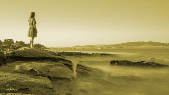 Is the Answer to the Overpopulation of Earth, More Monks? young girl looking over a desolate monochromatic landscape