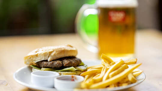 The High Price of Eating Out -- For Our Health and Environment hamburger, french fries, and beer