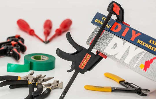 Who Can Fix Your Life? picutre of varius tools with a DIY sticker