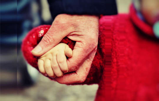 A Few Simple Things I’ve Learned Along The Way a young child walking and holding her father's hand