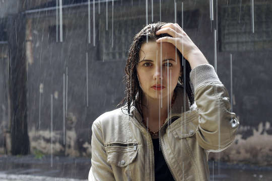 Feeling Waaaay More Messed Up Than I Thought I Was young woman standing under the rain