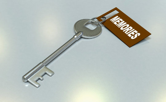 Forgiveness: The Unavoidable Transition to a Better World a silver old-style pass key with a tag that says "Memories"