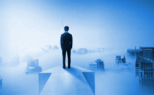 What Do You Believe? Practicing What You Already Know a man standing looking over a citiscape
