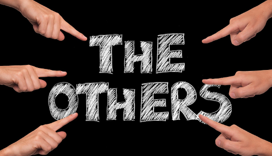 4 Ways To Know You’re in Victim Mode hands pointing to the words "The Others"