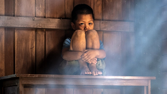 Adopted Children and the Lost Orphan Within a ;pme sad child sitting on top of a table