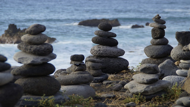 Are You A Perfectionist? The Imperfection of Seeking Perfection numerous stone towers facing the ocean