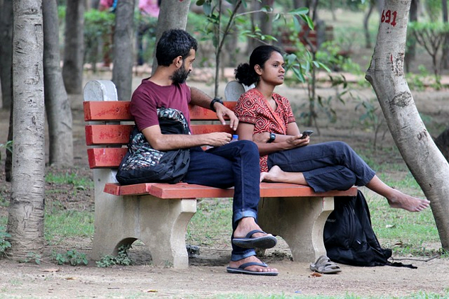 A Simple Formula to Resolve Differences a couple sitting on a bench