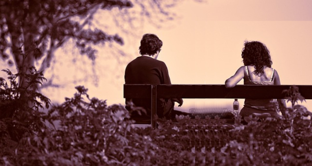 Living Our Lives with the Notion of "Divine Appointments" two people sitting far apart on a bench