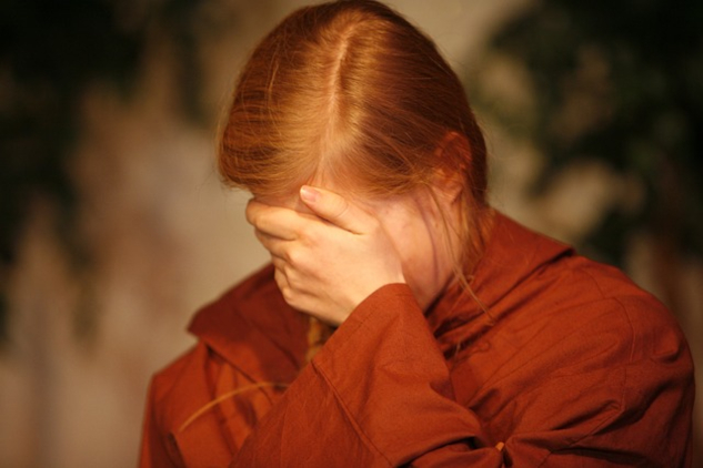 False Belief: I Can't Do This a person with their face hidden in their hands in despair