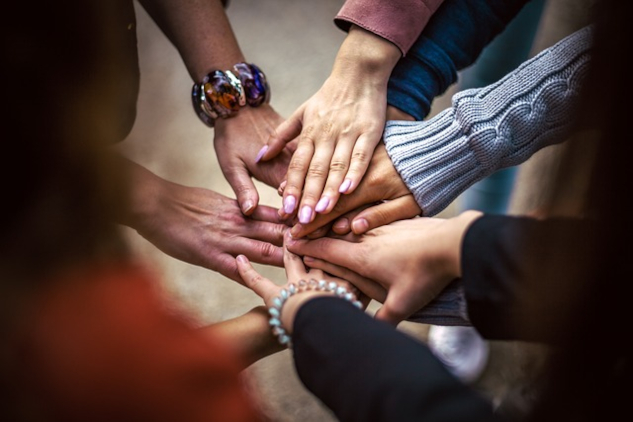 InnerSelf Magazine: May 5, 2025 hands all joining together. Image by Bob Dmyt from Pixabay. Image by Bob Dmyt from Pixabay.